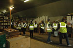 Loughborough University Taekwondo Club chaining out items for the containers.